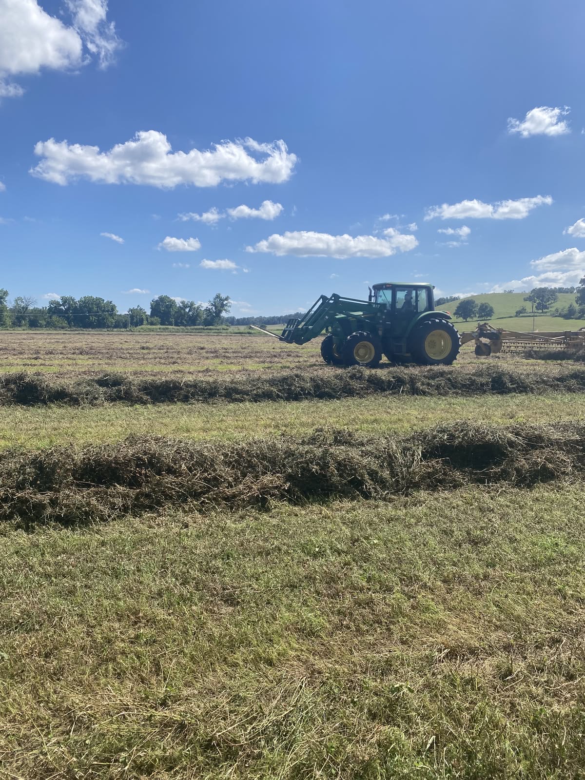 Tractor working an agricultural field